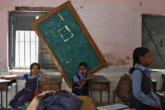 Schoolgirls inside their classroom in New Delhi.