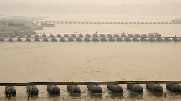 Under-constructed pontoon bridge spanning the river Ganga in Allahabad.