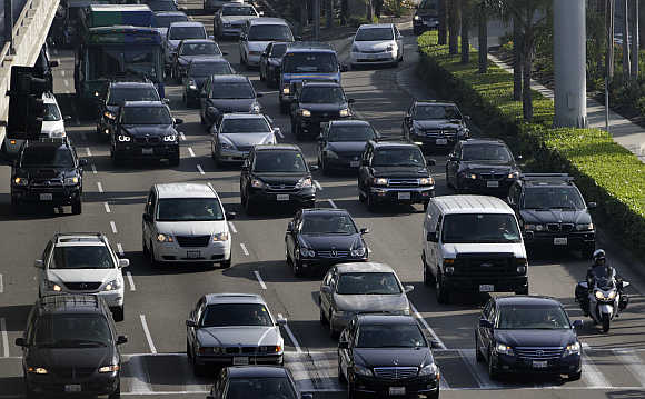 Traffic moves on the arrival level of Los Angeles International Airport in Los Angeles, California.