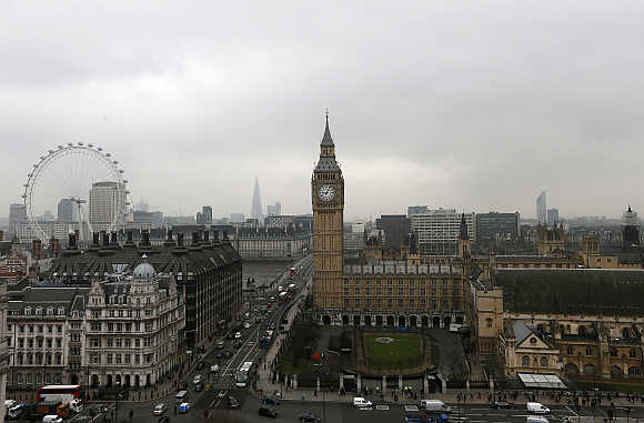 A view of Houses of Parliament and London Eye in United Kingdom.