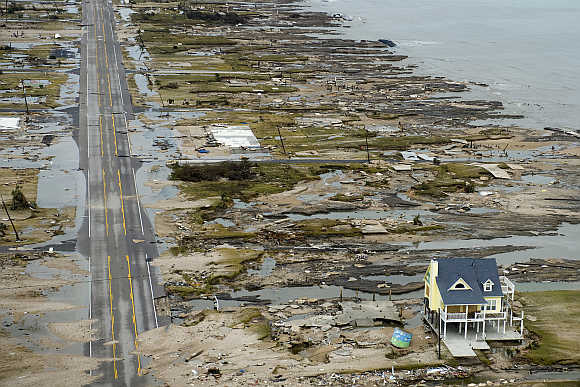 A home is left standing among debris from Hurricane Ike in Gilchrist, Texas, United States.