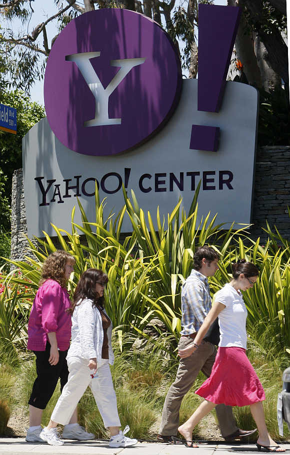 People walk past Yahoo! offices in Santa Monica, California.