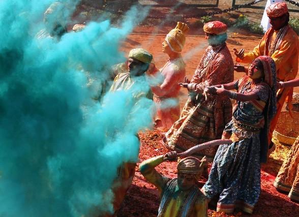 Artists in traditional attires perform during the Republic Day parade in New Delhi.