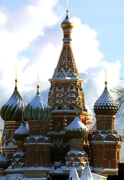 Workers clean snow from Red Square in front of St Basil's Cathedral in Moscow, Russia.