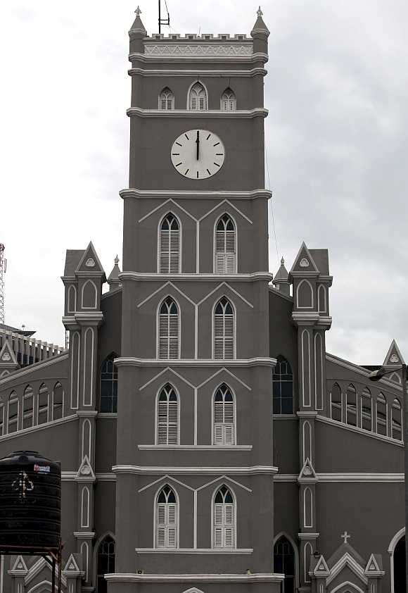 A clock at Lagos Cathedral Church strikes at 12 noon, in Nigeria.