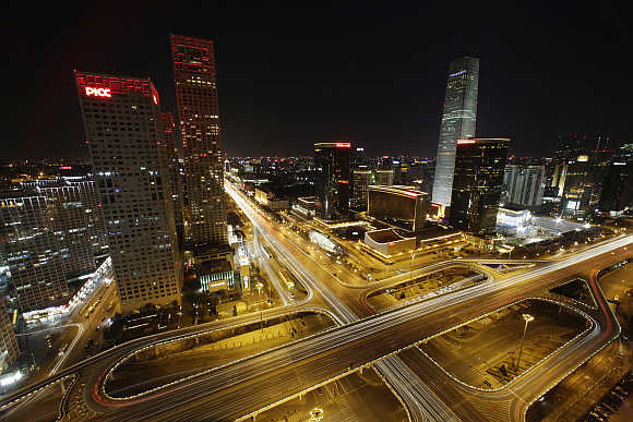 A view of Yintai Centre, left, and China World Trade Centre Tower III, right, in Beijing's central business district, China.