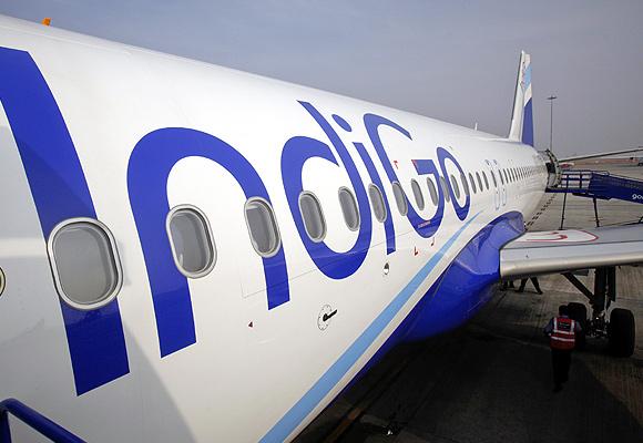 The side of an IndiGo Airlines A320 aircraft is pictured on the tarmac at Bengaluru International Airport.