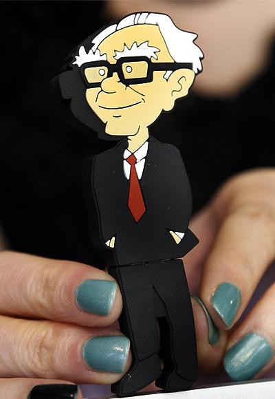 A Berkshire Hathaway souvenir USB memory stick cartoon figure of Berkshire Hathaway CEO Warren Buffett is for sale at a cocktail reception hosted by Berkshire-owned Borsheim's jewelry store on the weekend of the company's annual meeting in Omaha.