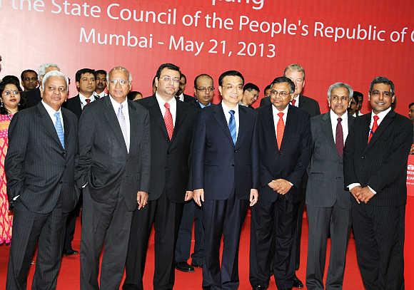 Chinese Premier Li Keqiang, centre, with senior officials, including Tata Group Chairman Cyrus P Mistry, third from left.