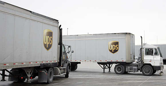 Trucks enter and leave the UPS facility in Hodgkins, Illinois, United States.