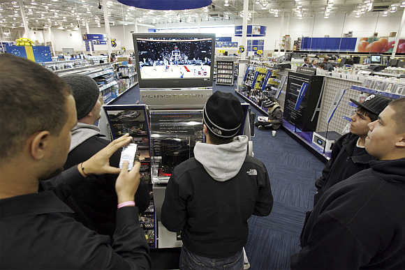 Visitors play on a Sony PlayStation 3 in Richfield, Minnesota, United States.