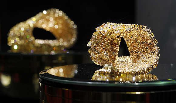 Gold jewellery is pictured on a stand at the Valenza international jewels exposition in Valenza, northern Italy.