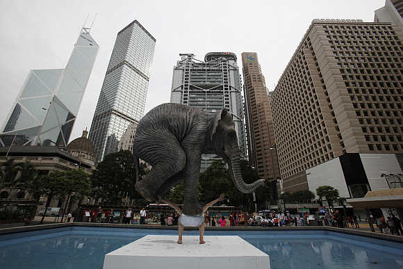 A five-metre-high sculpture 'Pentateuque' by contemporary French artist Fabien Merelle is displayed in Statue Square at Hong Kong's financial district.