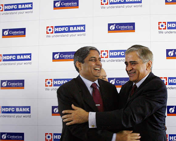 Rana Talwar, right, former chairman of Centurion Bank of Punjab, with Aditya Puri, Managing Director of HDFC Bank, in Mumbai.
