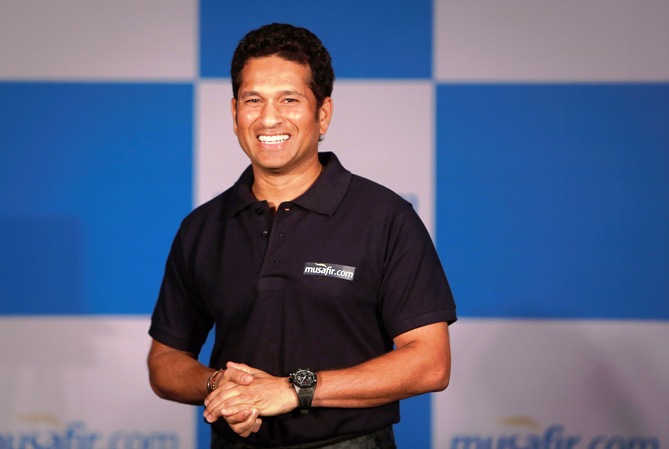 Sachin Tendulkar speaks during a news conference to launch a travel portal in Mumbai.