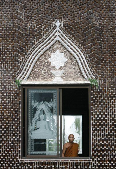 The Thai Buddhist temple has found an environmentally friendly way to utilize discarded bottles to reach nirvana -- using them to build everything in its premises, from a crematorium to shelters and toilets.