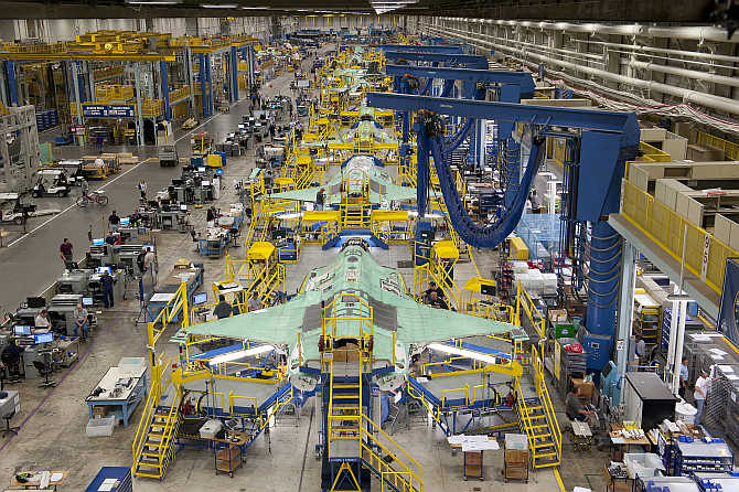 Workers can be seen on the moving line and forward fuselage assembly areas for the F-35 Joint Strike Fighter at Lockheed Martin Corp's factory located in Fort Worth, Texas.