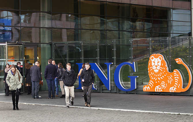 Employees of ING group during their lunch break in front of their office in Amsterdam, the Netherlands.