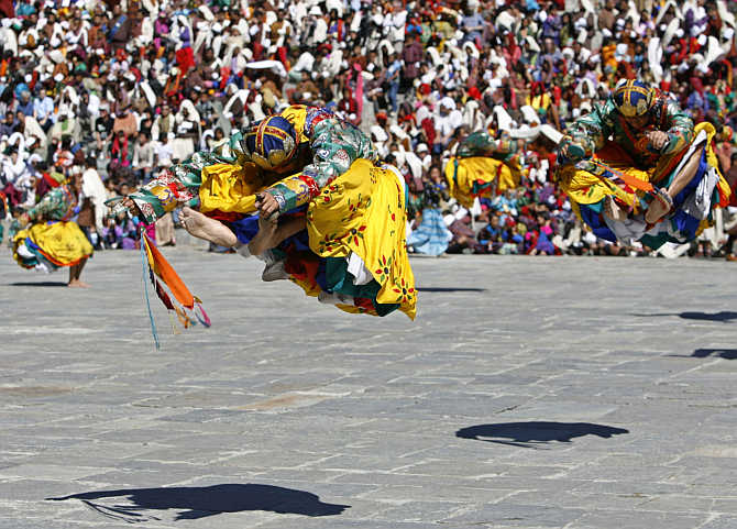 Dancers take part in the Tsechu festival in Thimphu, Bhutan.