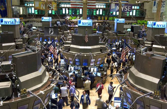  Traders work on the floor of the New York Stock Exchange.
