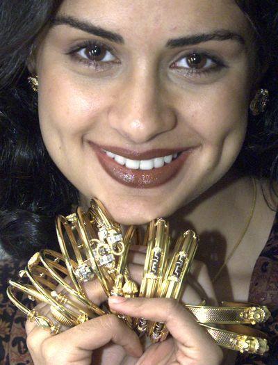 Actor Gul Panag promotes a collection of gold jewellery.