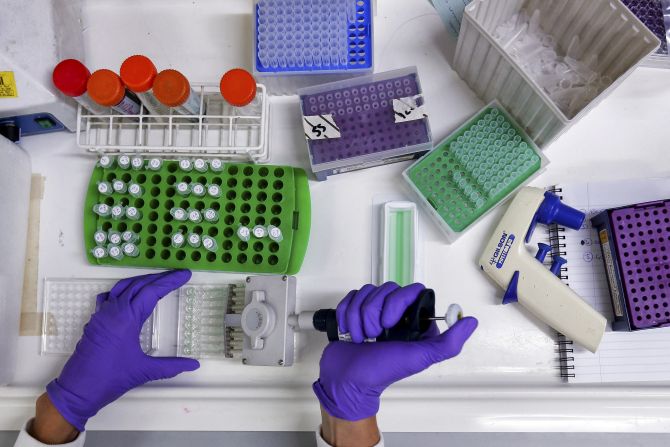 A scientist prepares protein samples for analysis in a lab at the Institute of Cancer Research.