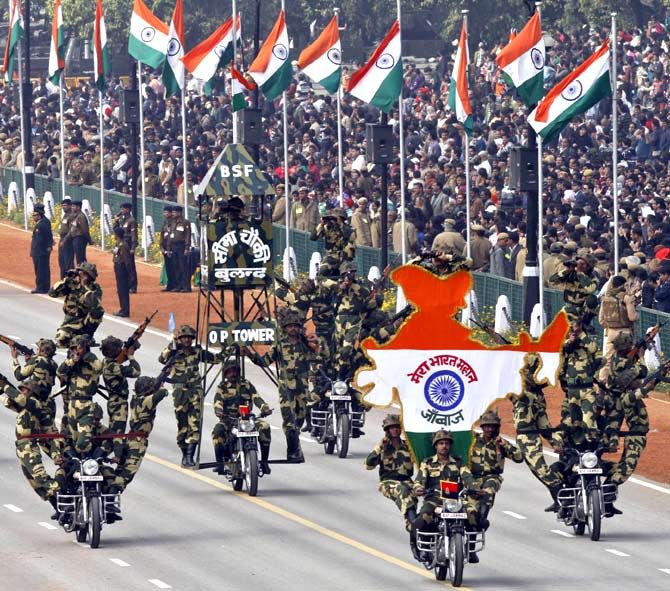 India's Border Security Force (BSF) "Daredevils" motorcycle riders perform as Republic Day parade in New Delhi 