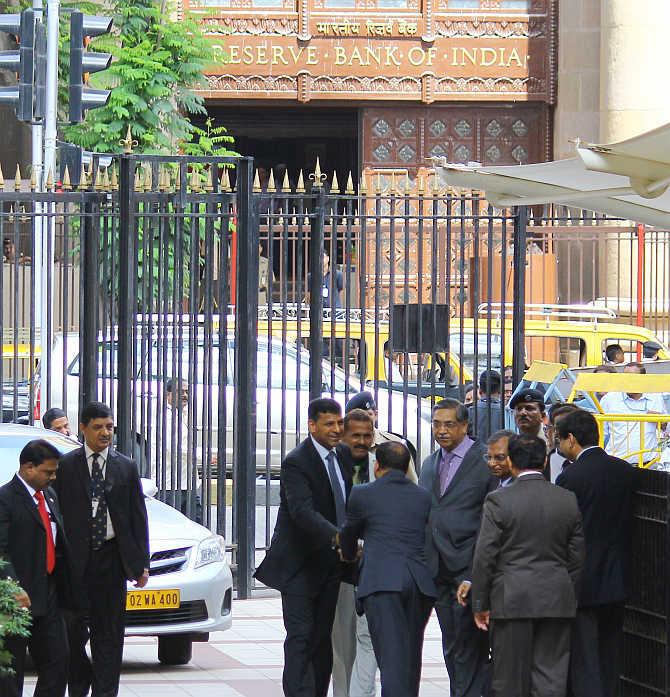 Raghuram Rajan being greeted by bankers as he takes over charge as the governor of RBI.