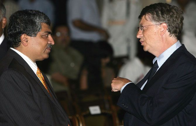 Nandan Nilekani, left, with Bill Gates