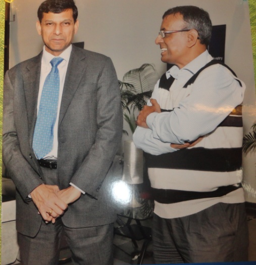Reserve Bank of India Governor Raghuram Rajan with Chandra Shekhar Ghosh. 