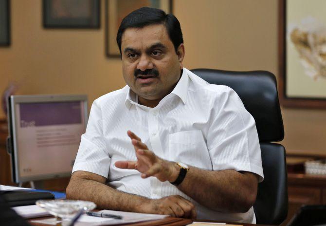 Indian billionaire Gautam Adani speaks during an interview with Reuters.