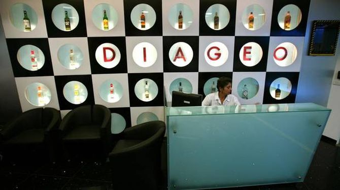 A receptionist sits at the office of Diageo, the world's largest alcoholic drinks maker, in Mumbai.