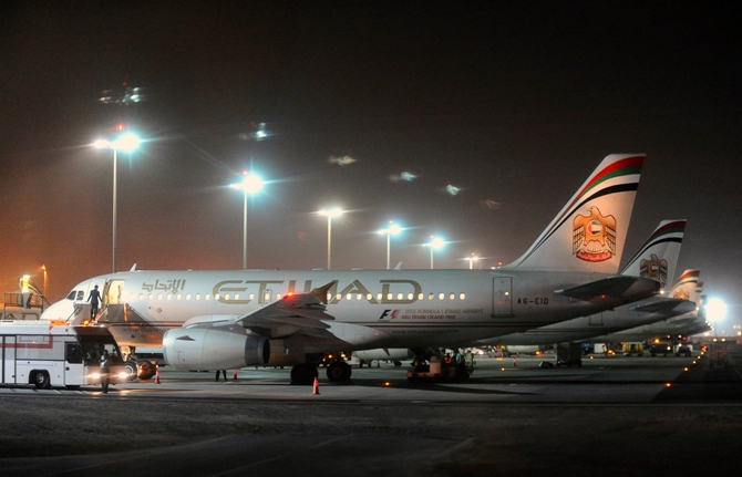 Etihad Airways aircraft are seen at Abu Dhabi International Airport.