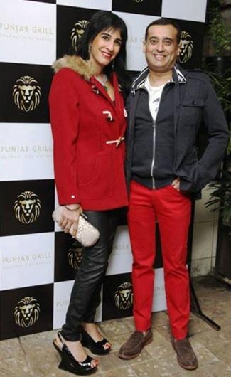 Amit Burman with wife Divya.