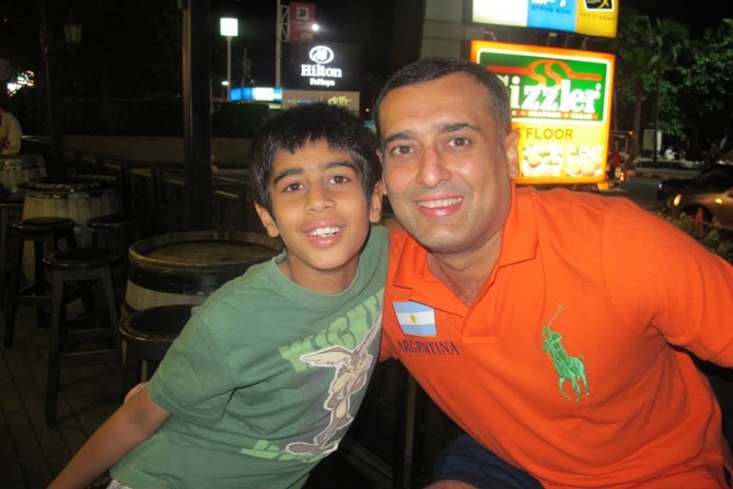 Amit Burman with his son.