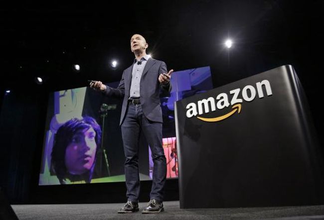 Amazon CEO Jeff Bezos discusses his company's new Fire smartphone at a news conference in Seattle, Washington in this file photo taken June 18, 2014. 