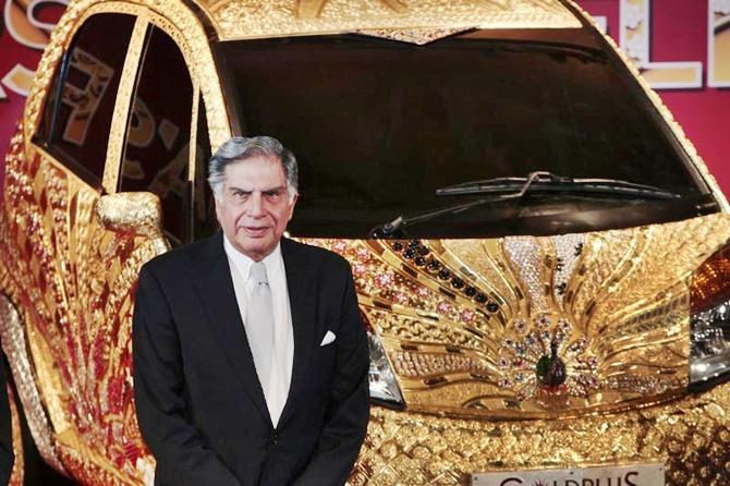 Chairman emeritus of Tata Group, Ratan Tata infront of the GoldPlus Tata Nano