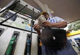 A worker at a petrol pump.