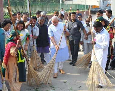 Prime Minister Narendra Modi launching the cleanliness drive for Swacch Bharat Mission from Valmiki Basti, in New Delhi. Photograph: PIB photos