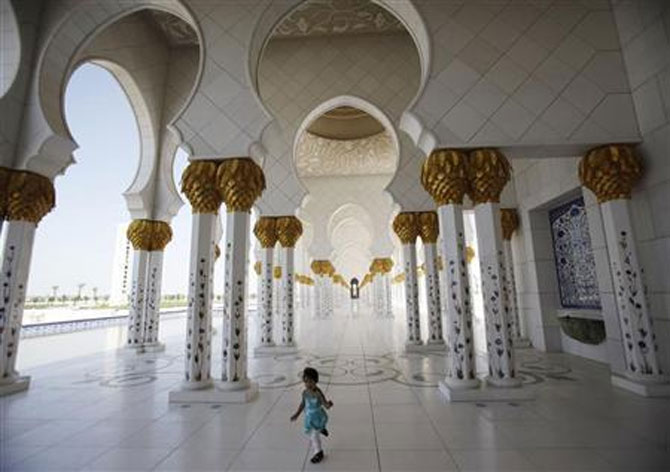 A child plays inside Sheikh Zayed mosque in Abu Dhabi.