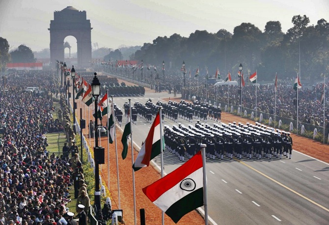 People watch Indian soldiers march during the Republic Day parade in New Delhi.