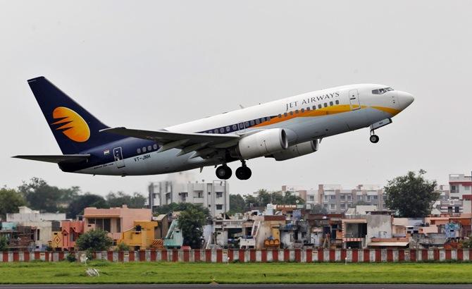 A Jet Airways passenger aircraft takes off from the airport in Ahmedabad.