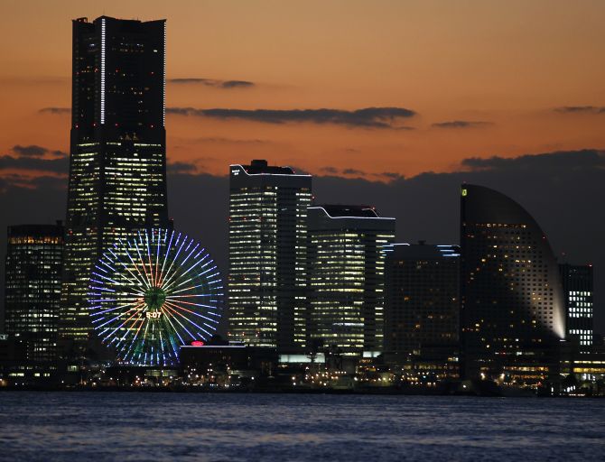 The sun sets over the venue of the APEC Summit in Yokohama, south of Tokyo.