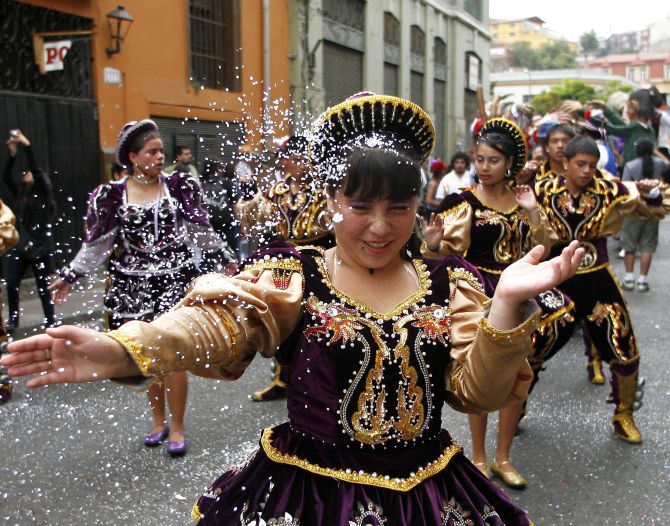 A reveller takes part in the Cultural Carnival in Valparaiso city, about 75 miles (120 km) northwest of Santiago.