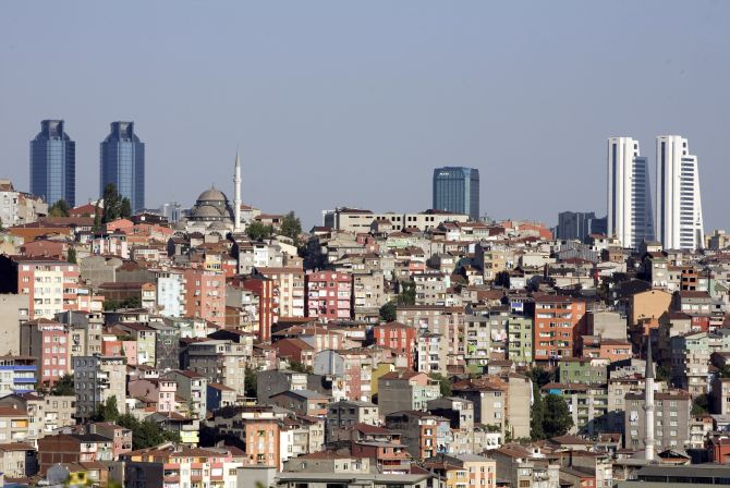 Skyscrapers in the city's business district shape the skyline over Gultepe district in Istanbul.