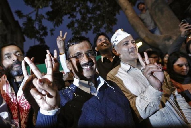 Arvind Kejriwal (C), leader of the Aam Aadmi Party.