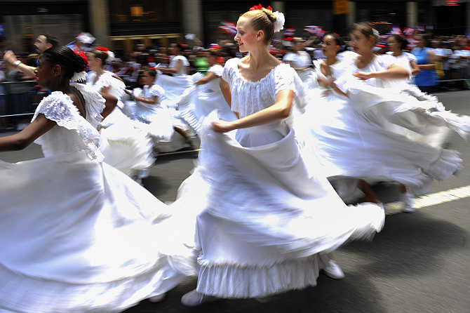 Dancers participate in the Puerto Rican Day Parade along New York's Fifth Avenue.