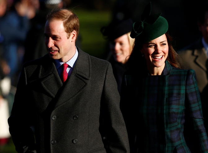 Britain's Prince William and Catherine, the Duchess of Cambridge, walk to a Christmas Day morning service at the church on the Sandringham Estate in Norfolk.