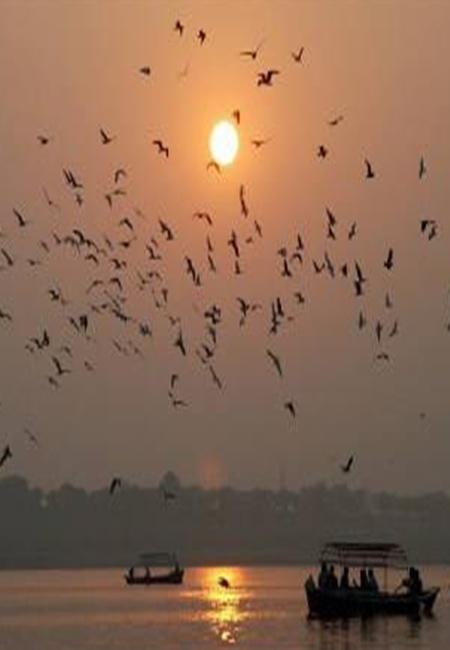 Sun setting over the banks of river Ganges in Allahabad.