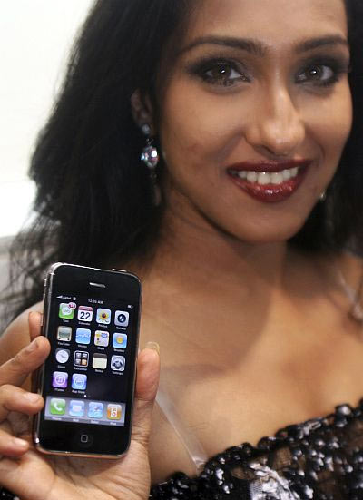 Actress Rituparna Sengupta holds her new Apple iPhone.
